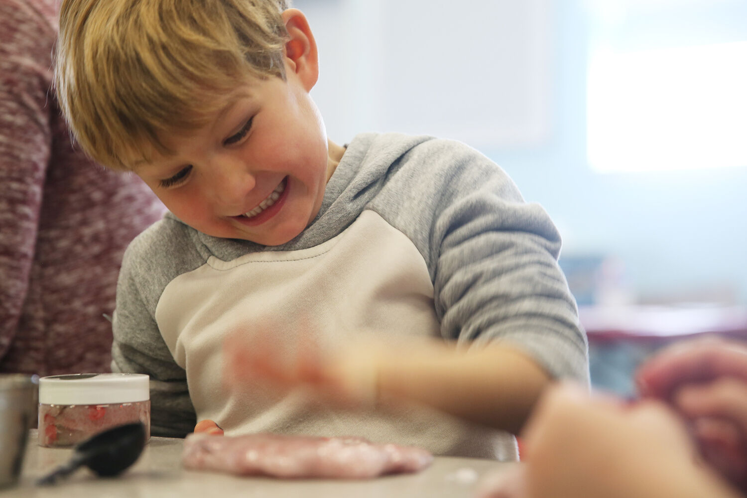 Malachi Beecher, 5, spanks his glob of goo until it is flat